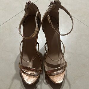 Metallic gold strap heels
